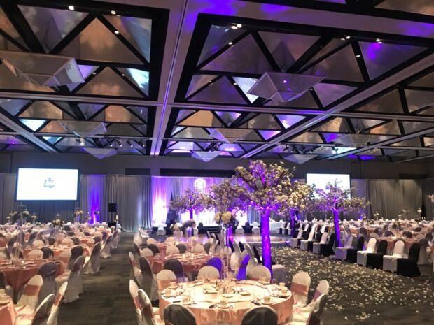 Banquet Setup with Uplighting and Cherry Blossom Trees