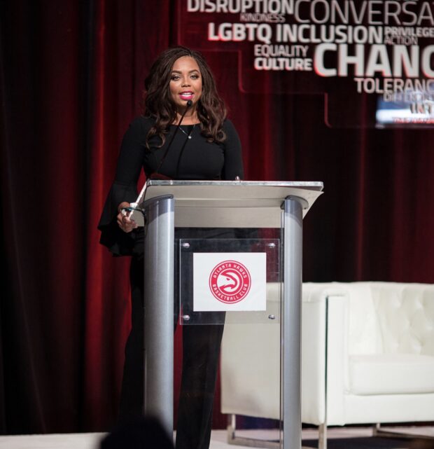 Atlanta Hawks stage setup with podium, backdrop drape, and event lighting for conference